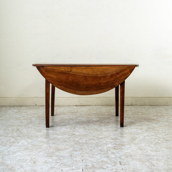 Round Walnut Dining Table