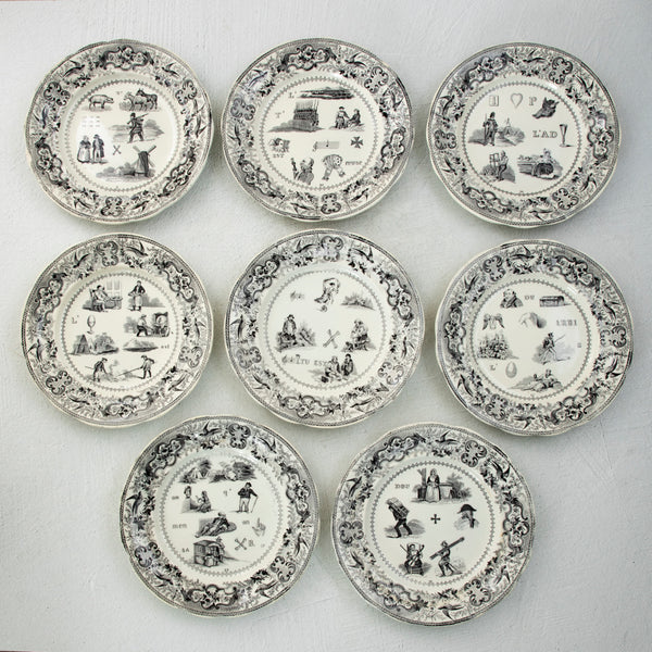 Set of Eight Rebus Plates