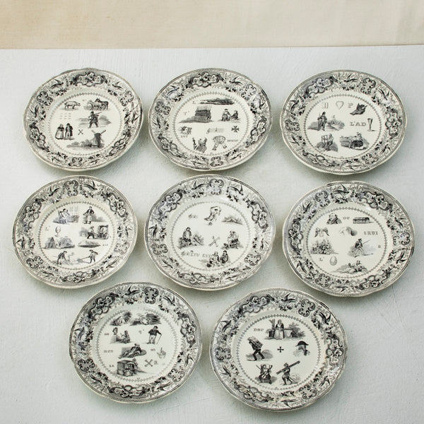 Set of Eight Rebus Plates