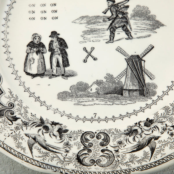 Set of Eight Rebus Plates